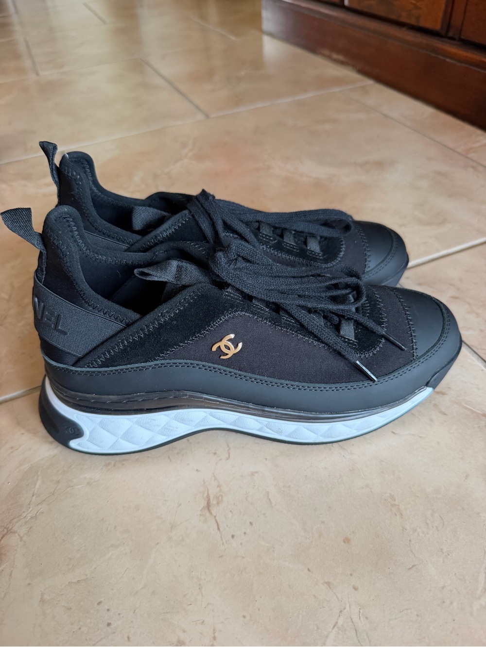 CHANEL Black & White Platform Lace-Up Sneakers with Gold CC